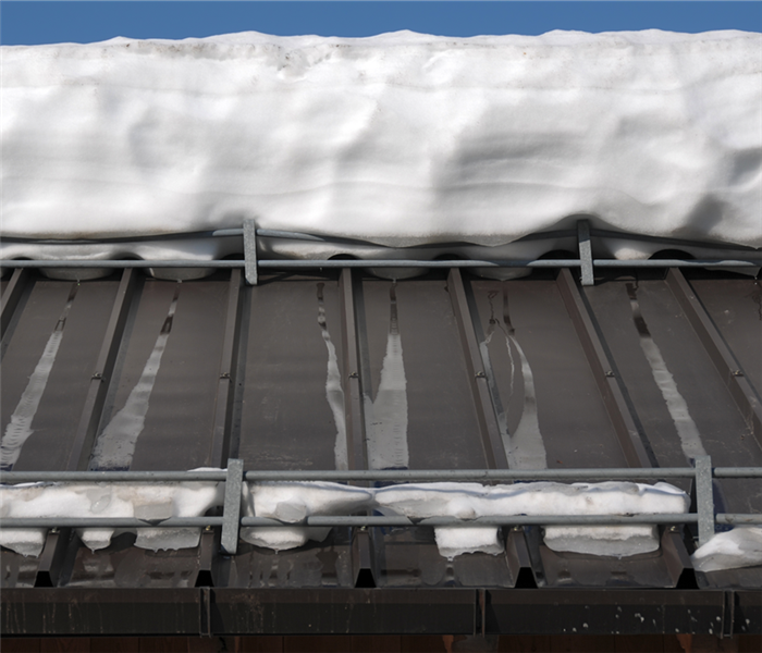 thawing snow on a roof