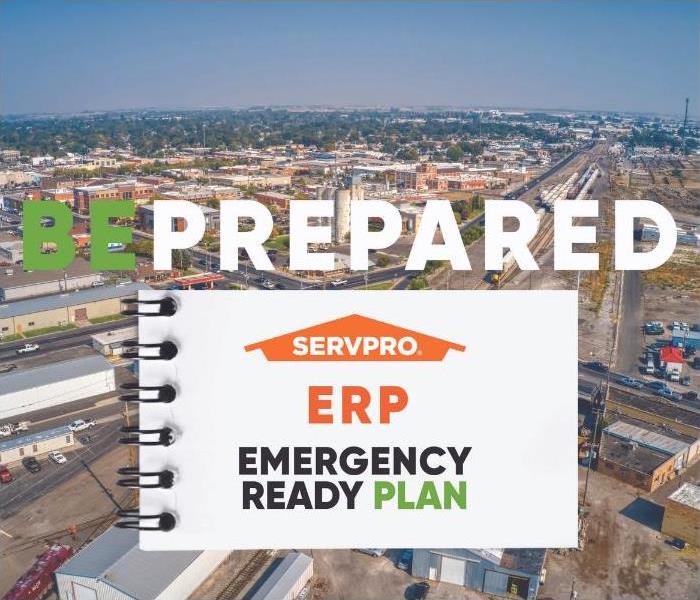 Notepad with SERVPRO logo and text "ERP Emergency Ready Plan" placed over city image with text "Be Prepared"